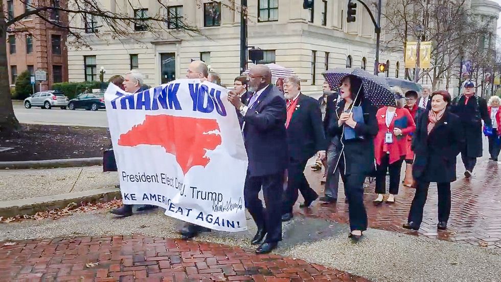 WATCH: NC electors sing 'God Bless America' as they march to vote for Donald Trump