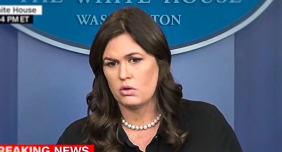 From White House podium, Sarah Sanders reads denial from alleged wife beater -- smearing the victims as liars
