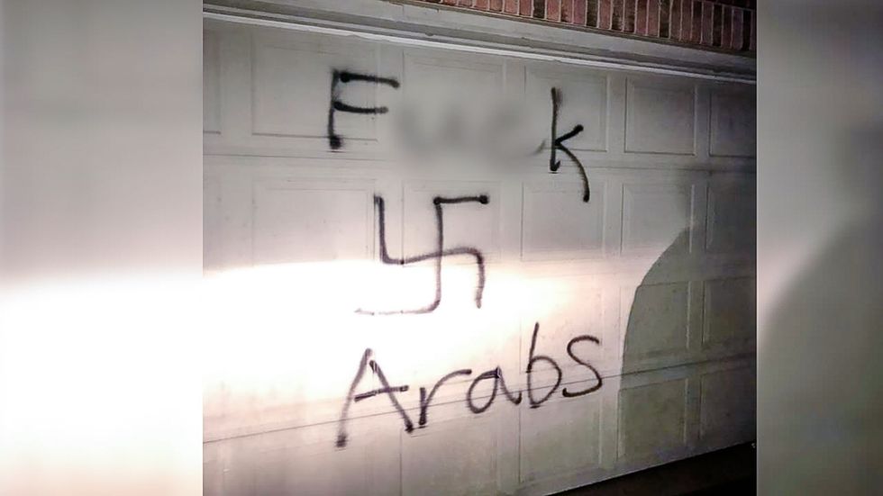'F*ck Arabs': Horrified Muslim woman finds swastika and hate speech painted on her Ohio home
