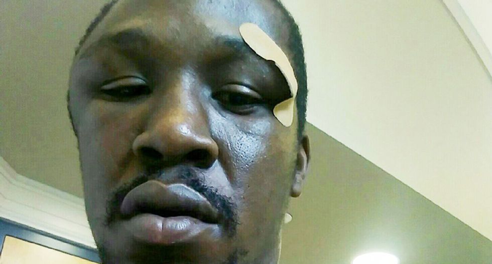 WATCH: Body-cam video shows North Carolina cop restraining black man as his partner beats him for jaywalking