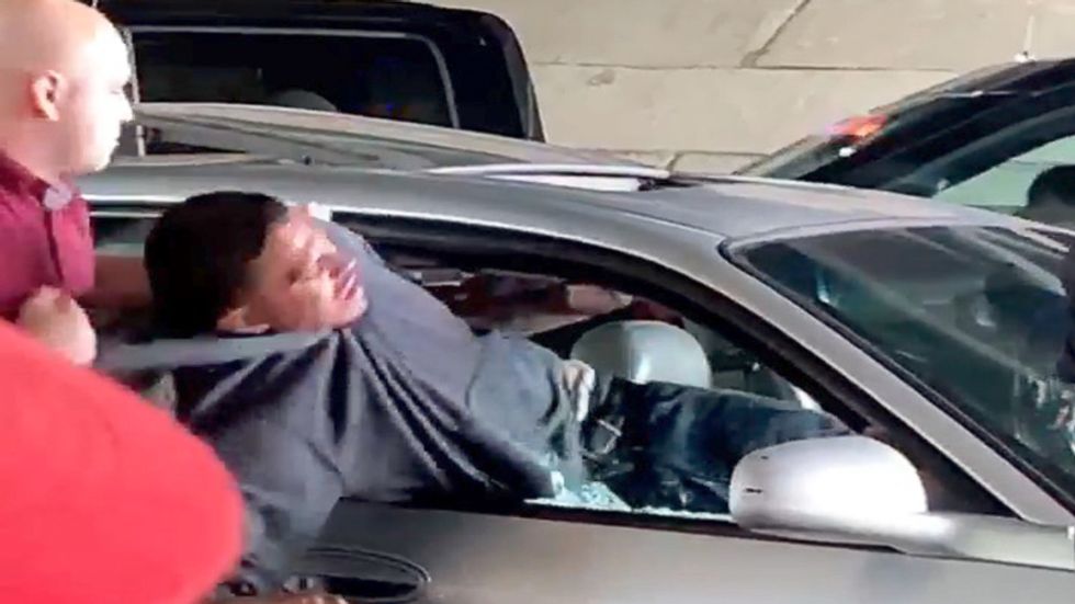 'That's abuse': Missouri cop breaks car window with bare arm and pulls unarmed black man out head first