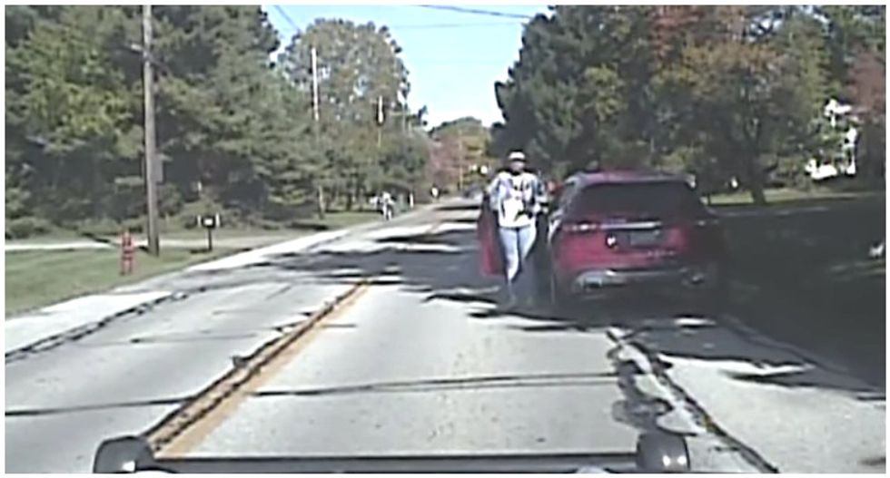 Cops pull guns on unarmed Black woman during routine traffic stop – blame her car’s windows
