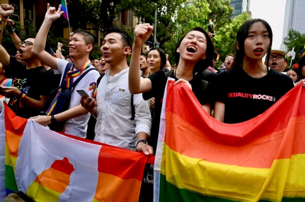 Taiwan holds first gay marriages in historic day for Asia