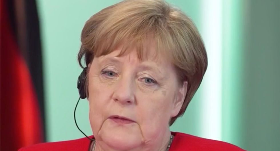 WATCH:  Germany's Angela Merkel sounds the alarm on rise of right-wing 'dark forces' in Europe and America