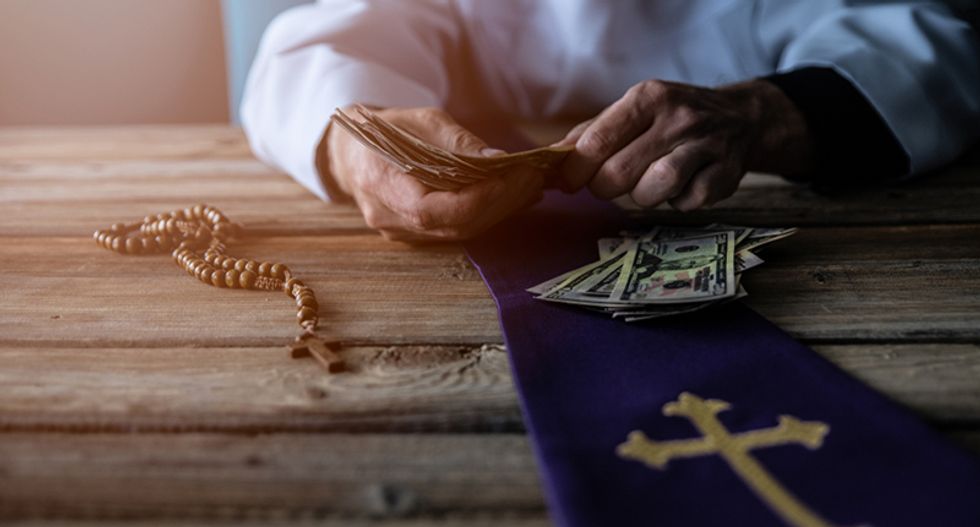 Catholic church has a secret oil money fund in West Virginia -- and one bishop is using it to pay people off