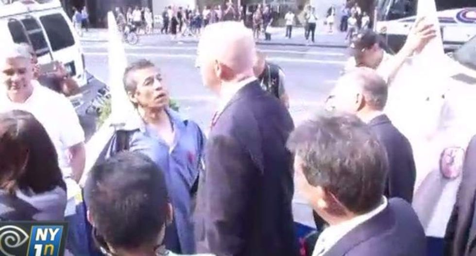 Security guard punches Latino man during protest against Donald Trump
