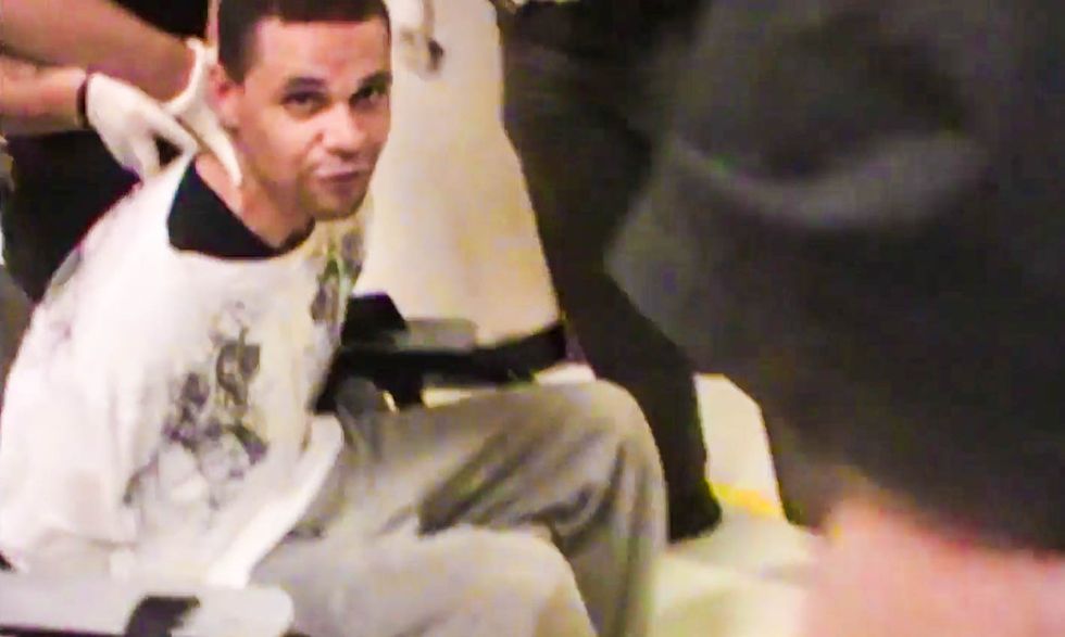 'I can't breathe!': Video reveals Ohio cops pepper spraying man while he's strapped in chair
