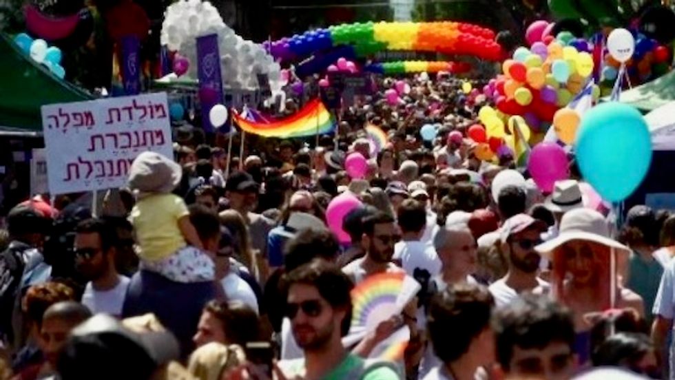 250,000 people revel in  Middle East’s biggest #LGBTQ Pride parade