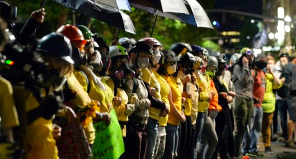 'We need to do something': Moms and dads rally behind Portland protesters
