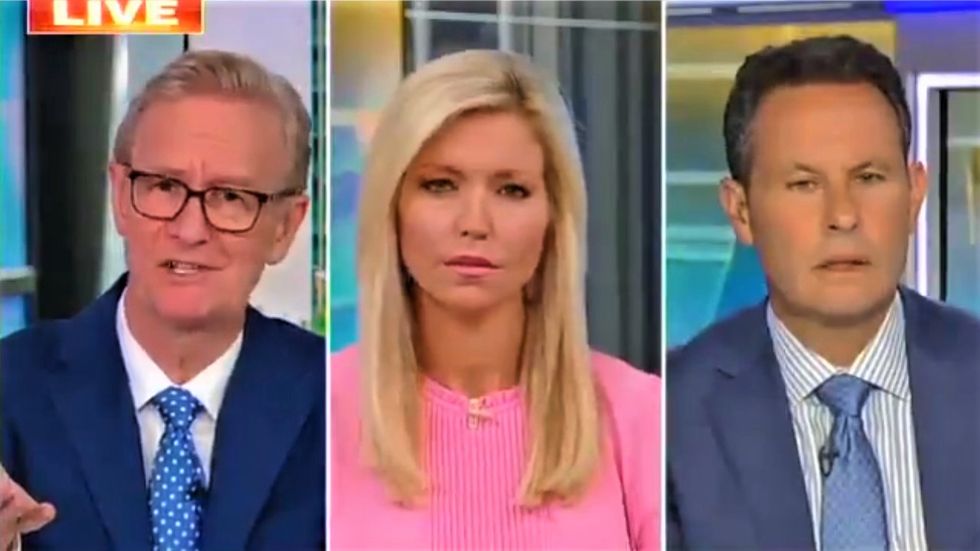 Fox & Friends hosts look visibly uncomfortable when Trump calls the media the 'enemy of the people'