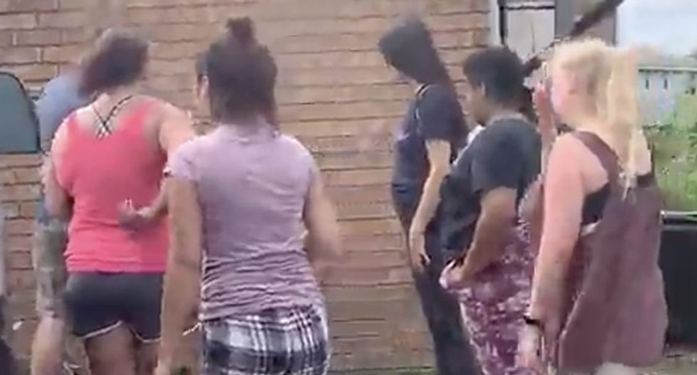 Neighbors in Nashville suburb form human chain to prevent ICE from taking man into custody