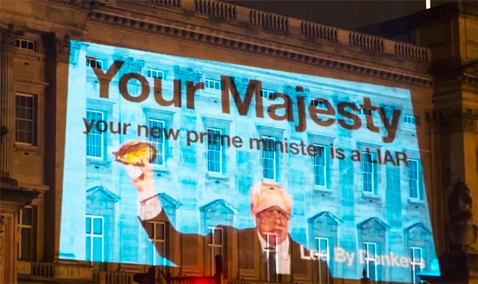 'Your new prime minister is a liar': UK's Boris Johnson greeted by massive protest projected onto Buckingham Palace