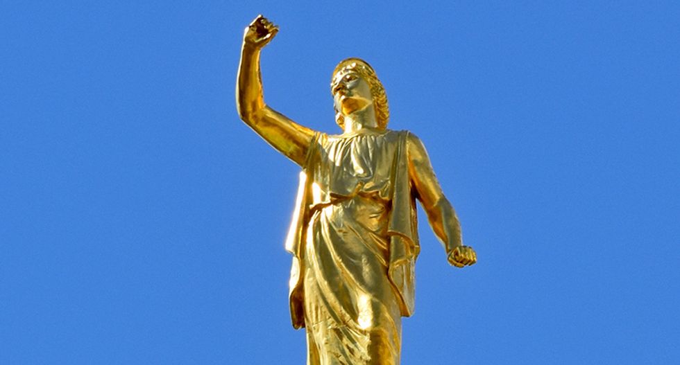 Some Mormons see a message in the Angel Moroni's fallen trumpet