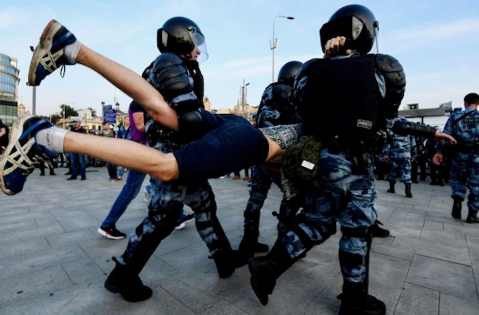 Russia launches criminal probe after mass protest for fair elections