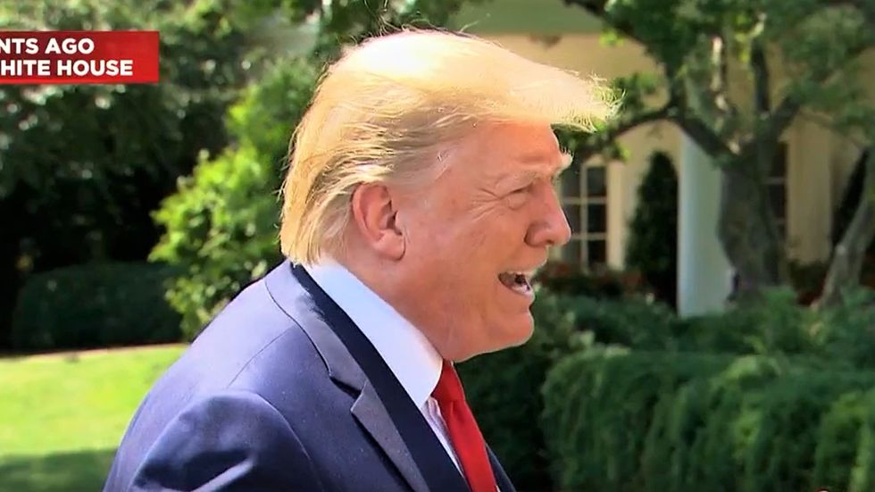 Trump tells reporters that 'we’re trying to find out' the identity of federally protected whistleblower
