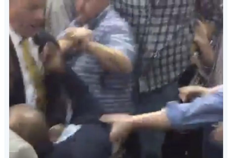 'Get him the hell out of here!': Trump sics supporters on black protester who gets beaten and kicked