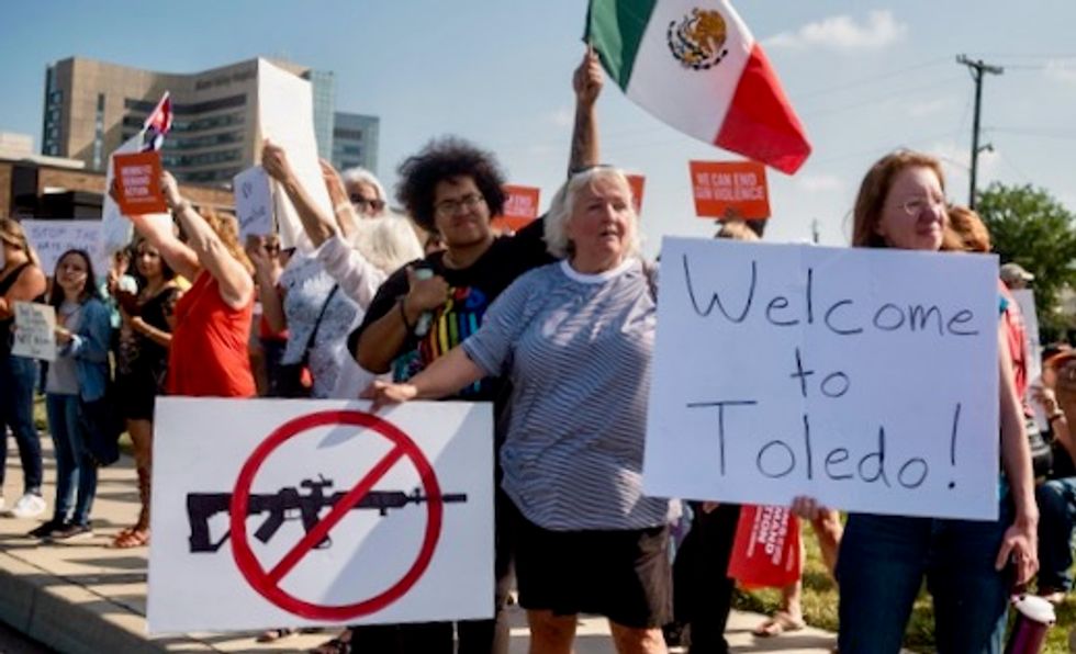 'We don't want him here': Trump consoles shooting victims, faces new criticism