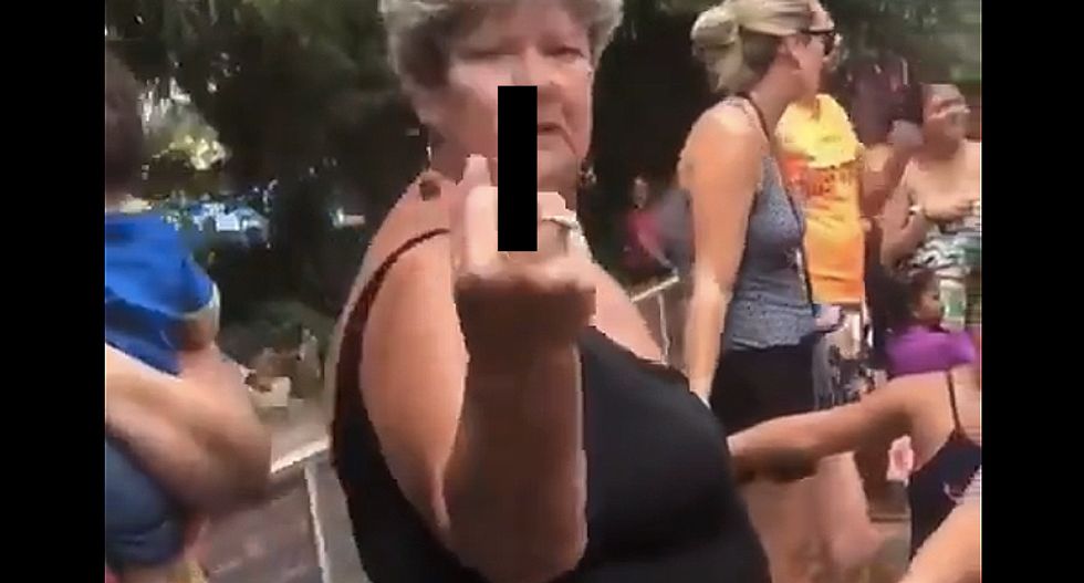 'Go back to where you came from': White woman shoves and flips off Muslim woman at water park — in front of kids