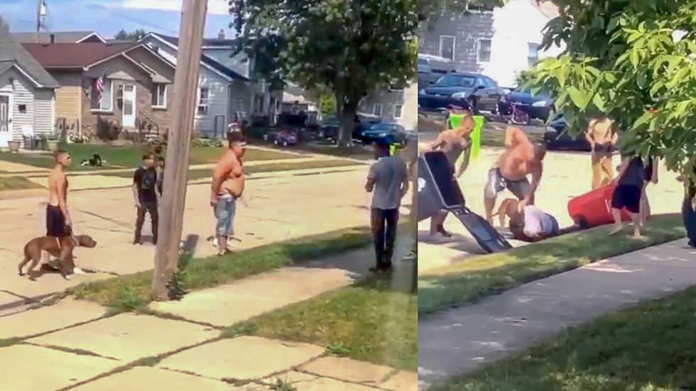 WATCH: Gang of white people release dog to viciously attack black man during fistfight