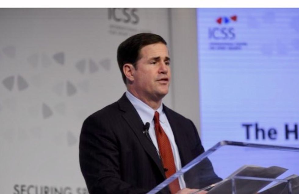 Arizona governor signs bill to boost teachers' wages