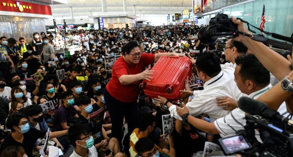 WATCH LIVE: Chaos in Hong Kong airport as police clash with pro-democracy demonstrators