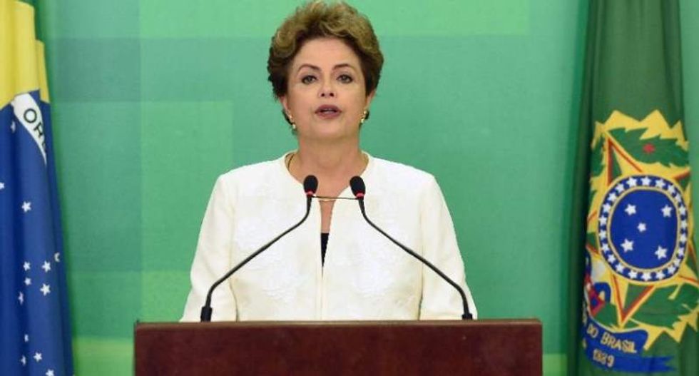 Brazilian lawmakers begin to debate over whether to impeach President Dilma Rousseff