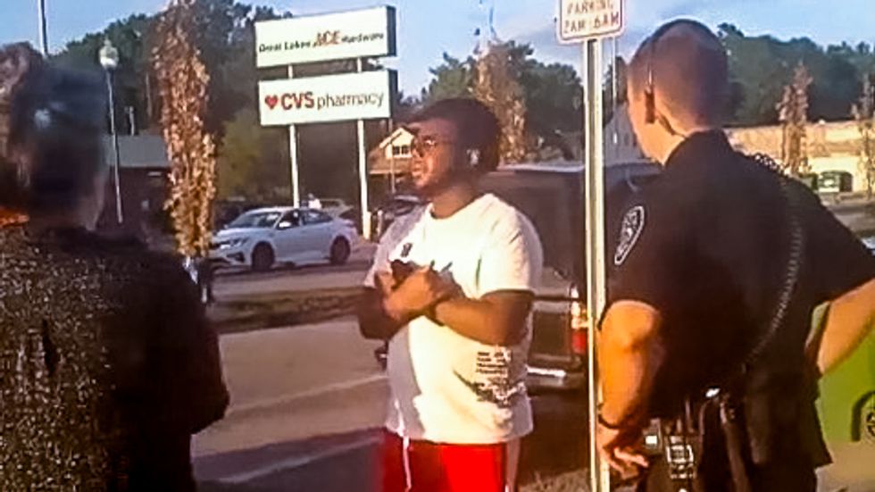 WATCH: Michigan police stop black man for 'looking suspiciously' at white woman