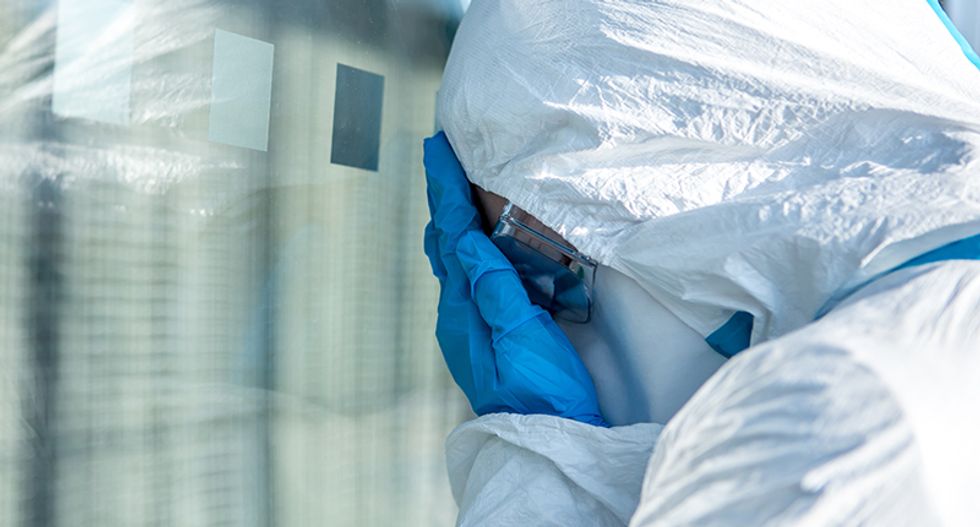 A nurse’s hospital wouldn’t let her wear an N95 mask -- she hasn’t been back to work in weeks