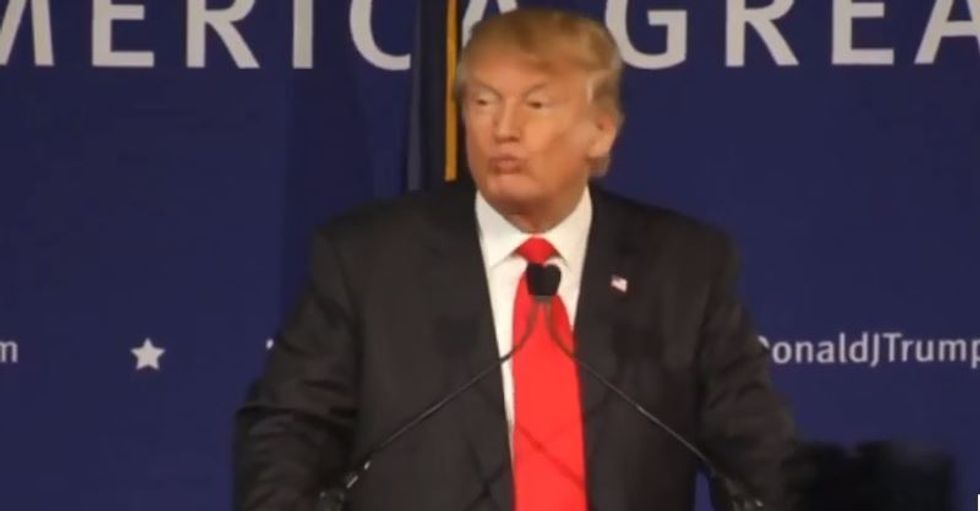 Protester who bumped rally-goer charged with assault after Trump supporter's mom whines to police