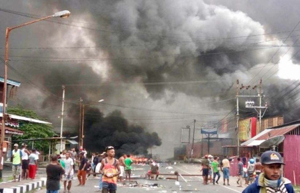 Thousands riot in Papua, parliament building torched
