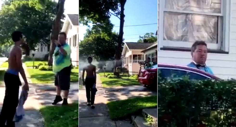 WATCH: White man sprays black teen with hose after hurling racist abuse and claiming to be KKK member