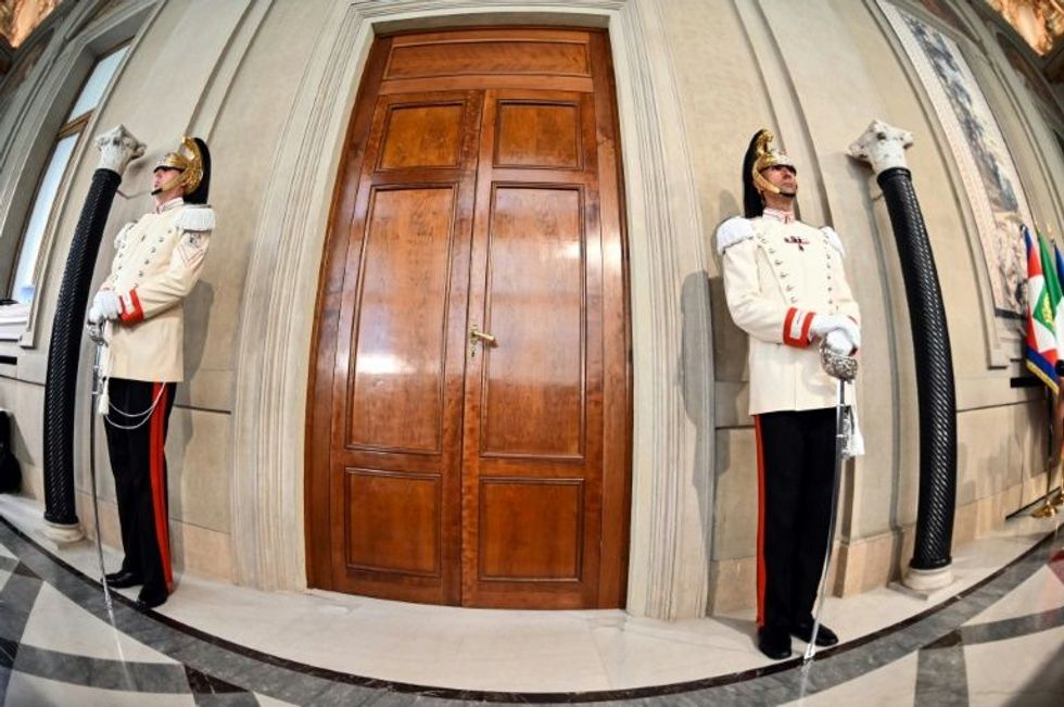 Second day of Italy crisis talks after prime minister resigns