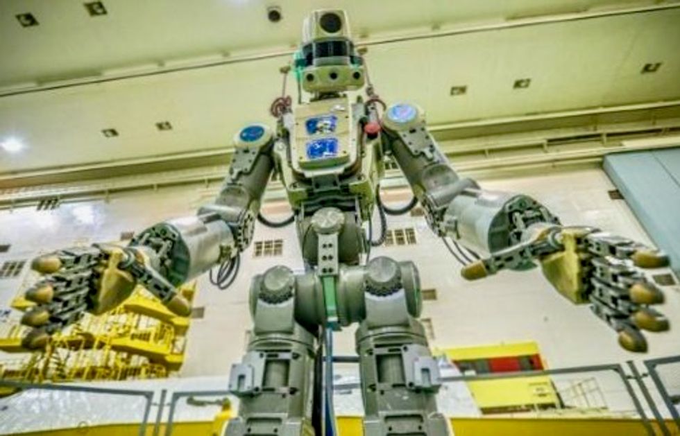 Spacecraft carrying Russian humanoid robot docks at ISS