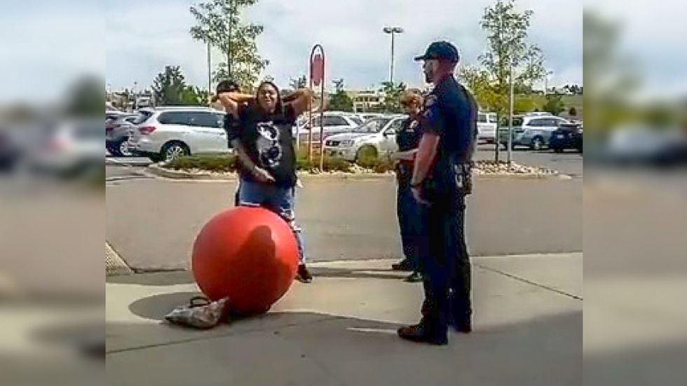 'They violated me': Cops search black pregnant woman for gun after Target reports her over coupon dispute