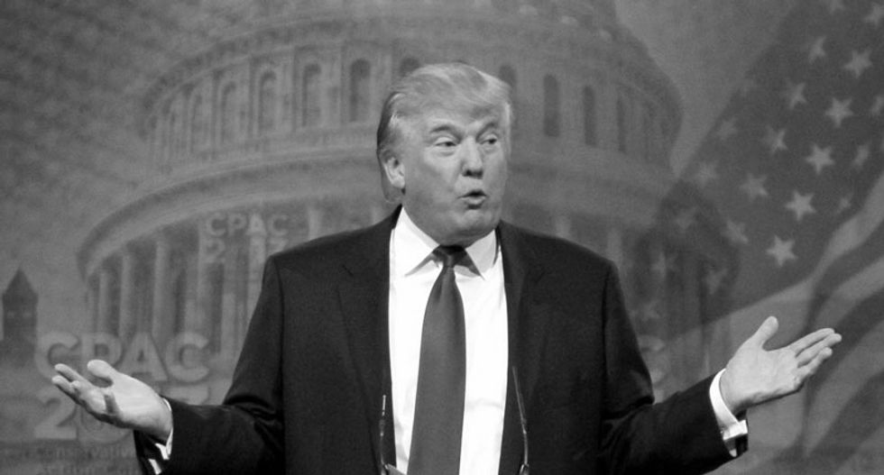 Twitter 'hides' Donald Trump tweet for 'glorifying violence'