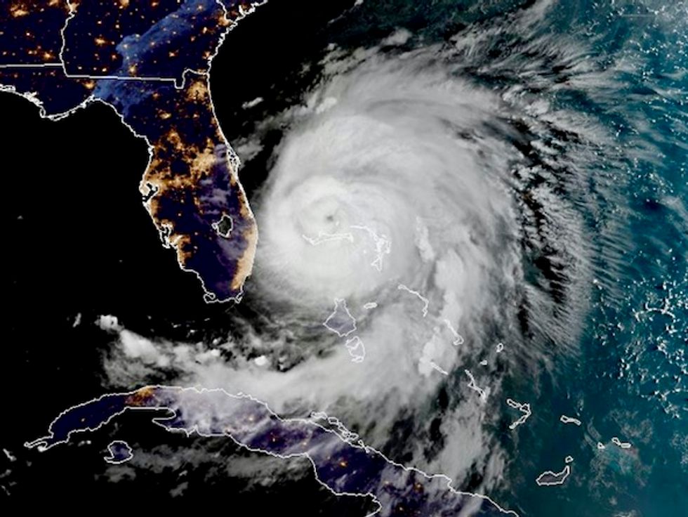 Dorian crawls toward US coast, weakening to Category 2 storm