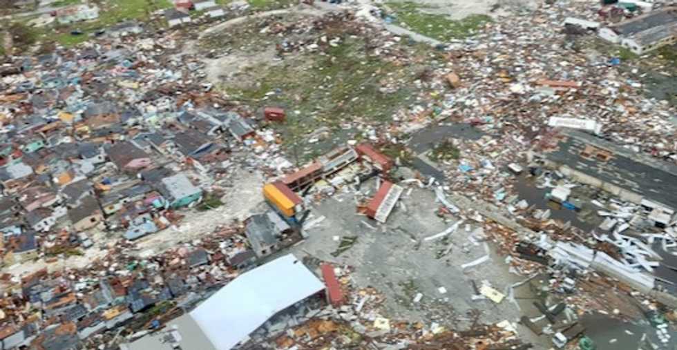 As aerial footage of devastated Bahamas emerges, campaigners ask how much destruction and death before global climate action taken?