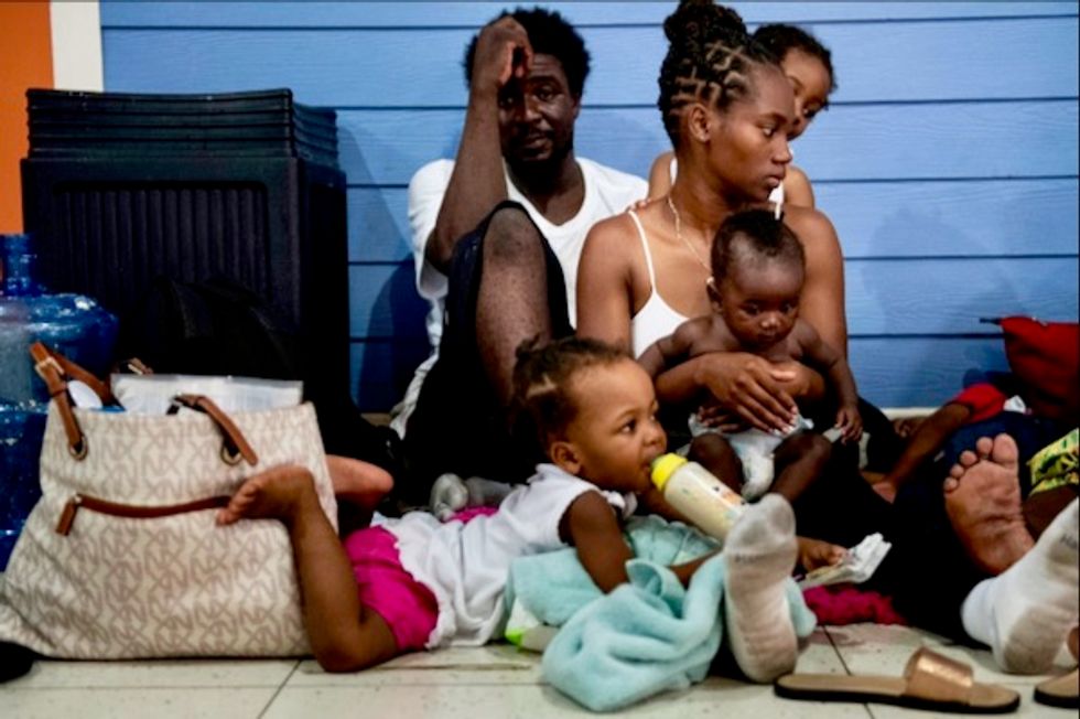 Grim search for bodies in ravaged Bahamas as survivors await relief