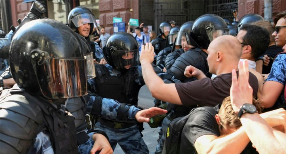 Russians go to polls after summer of protests