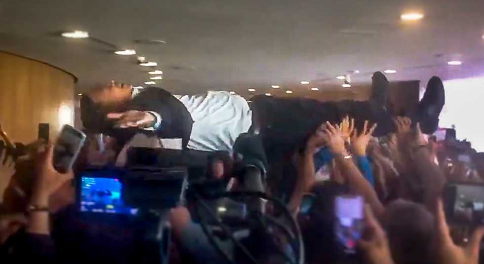 Crowdsurfing video of presidential candidate Andrew Yang goes viral