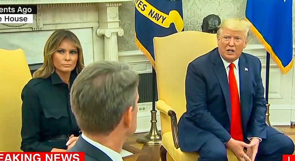 'His frontal lobe is melting': Donald Trump labeled 'lousy dad' after he says Melania 'has a son'