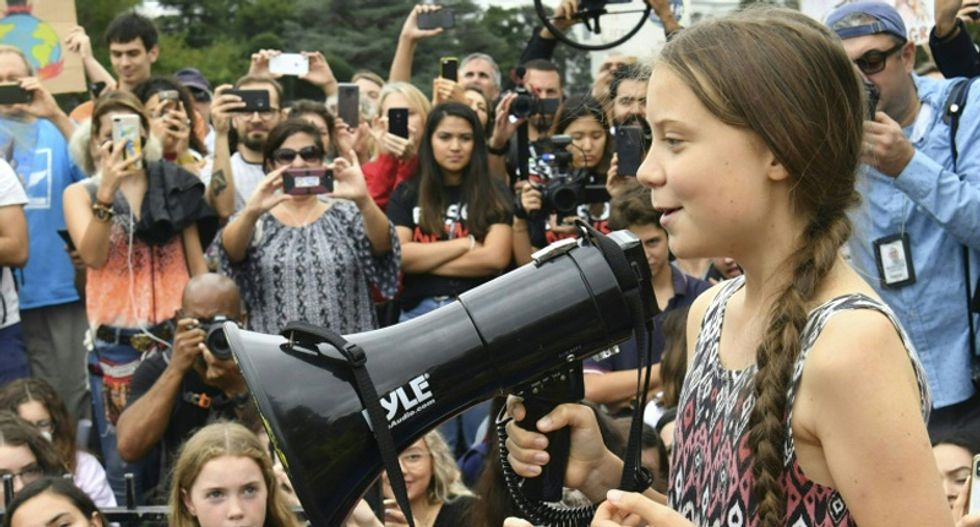 Teen climate activist Greta Thunberg protests at White House