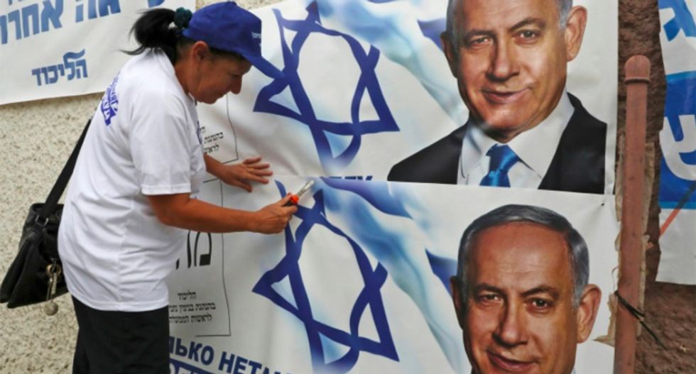 Netanyahu, Gantz spur supporters on eve of tense Israeli polls