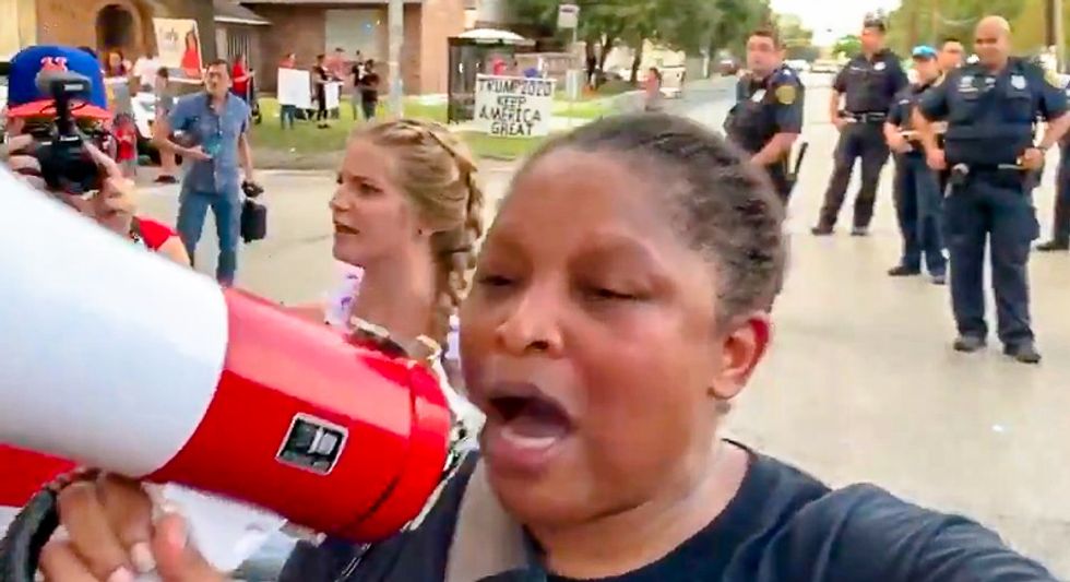 ‘You need to go’: White woman screaming about abortion gets pulled away by cops for heckling black speaker