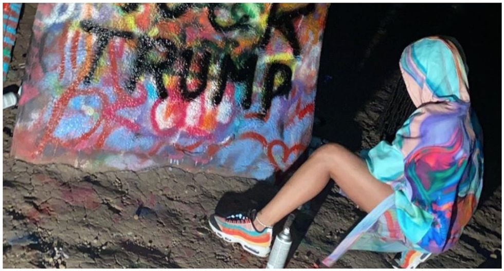 Trump supporters fume over Rihanna’s Cadillac Ranch art in Texas – and cover it up with QAnon messages