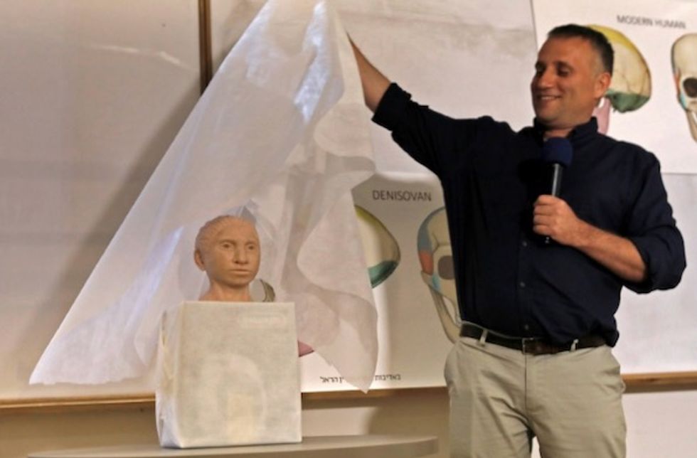 Israel scientists unveil appearance of ancient human relative