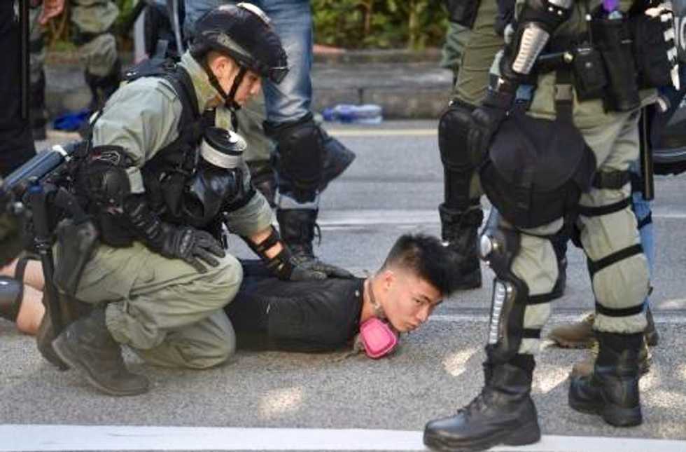 Hong Kong police, protesters clash in 16th weekend of rallies