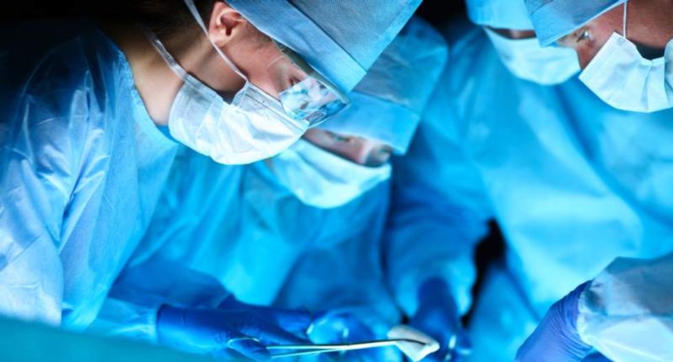 Doctor accused of reusing anal catheters on dozens of patients