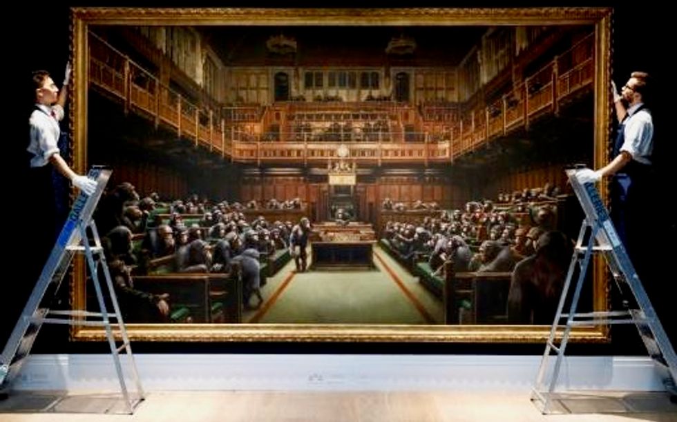 Banksy painting mocking Britain’s parliament smashes record at auction