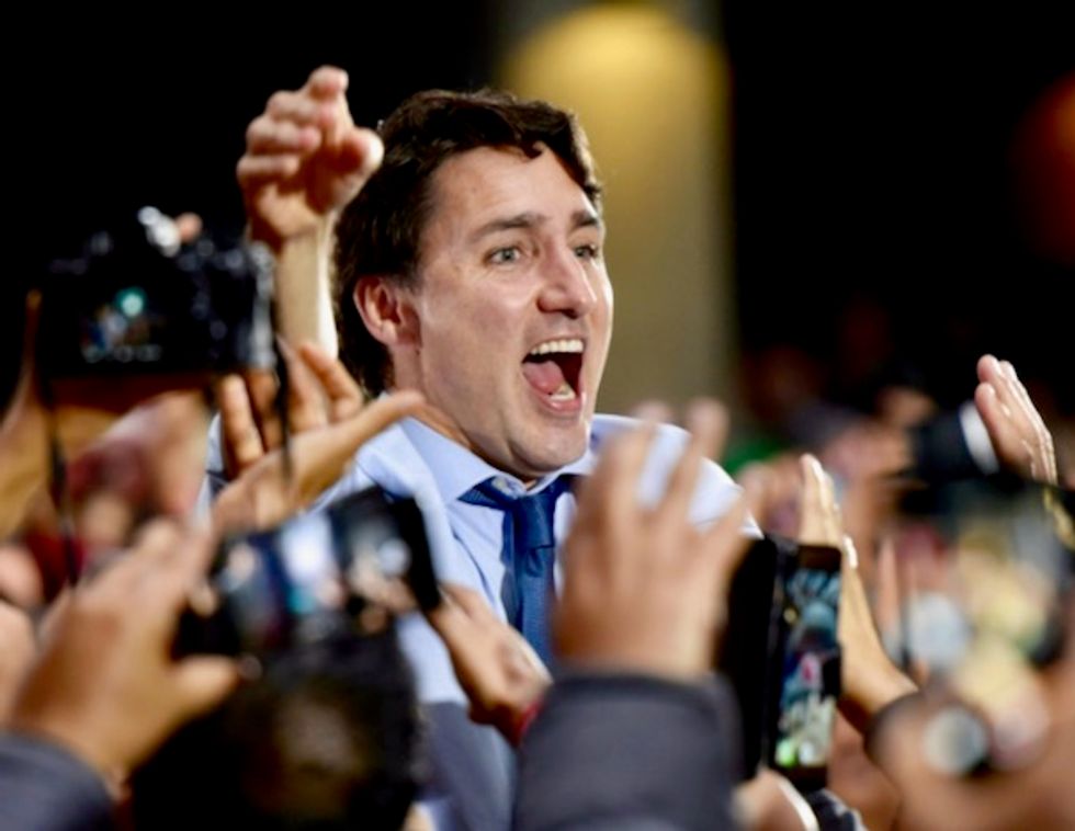 Canada vote too close to call as Trudeau hopes to cling on